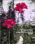 Cairns cover with pink flowers and trees